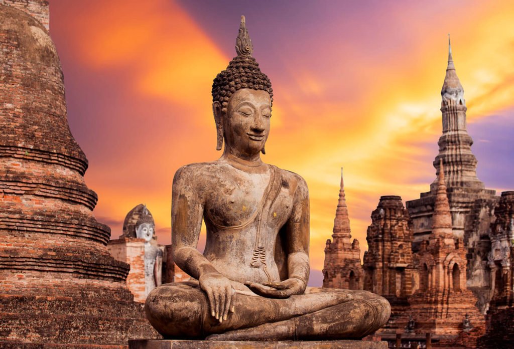 ancient-buddha-statue-at-sukhothai-historical-park-mahathat-temple-thailand-62617514