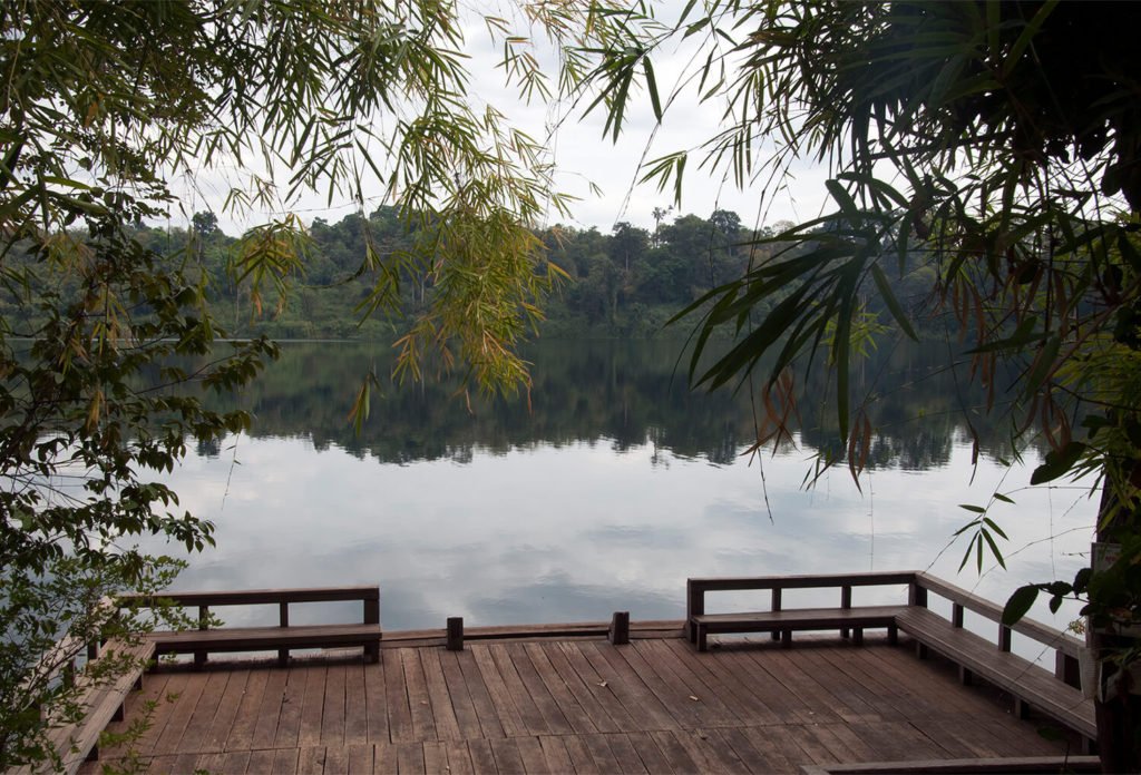 banlung-cambodia-view-of-yeak-lom-lake-with-wooden-platform-in-foreground-116077983