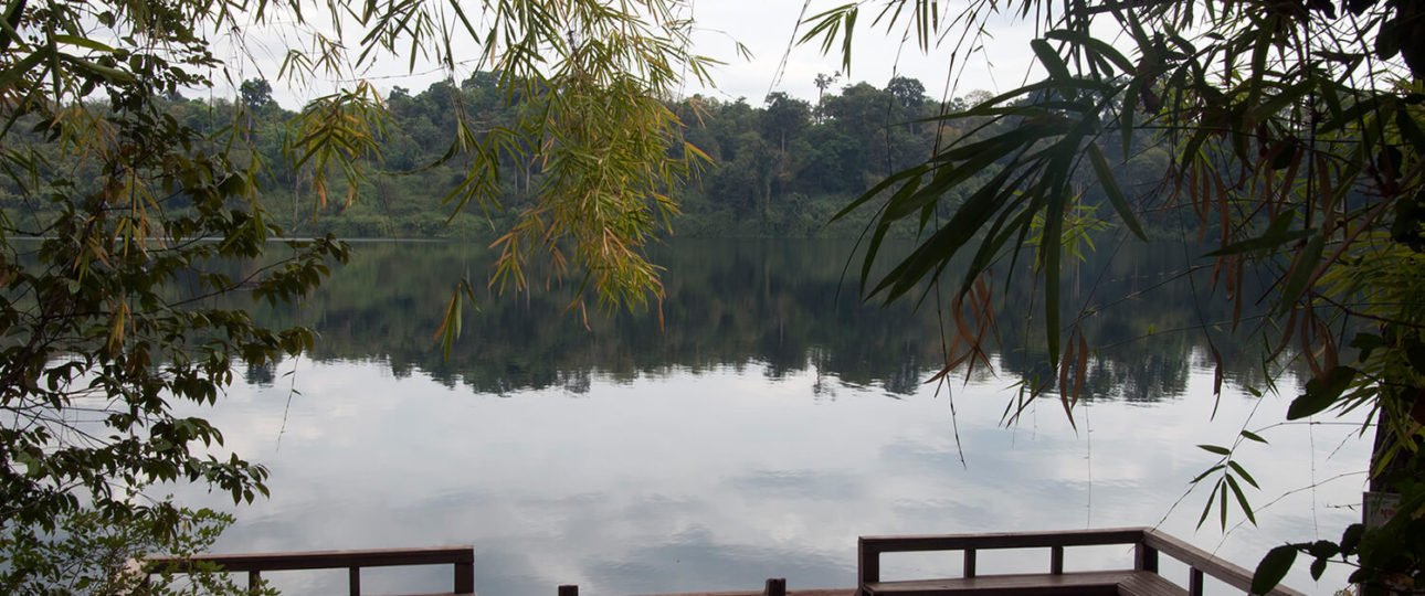banlung-cambodia-view-of-yeak-lom-lake-with-wooden-platform-in-foreground-116077983