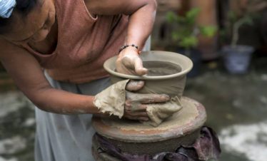 Picture of Asian Lady doing Pottery
